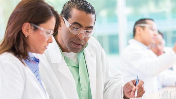Thumbnail image of a doctor and nurse looking at a paper